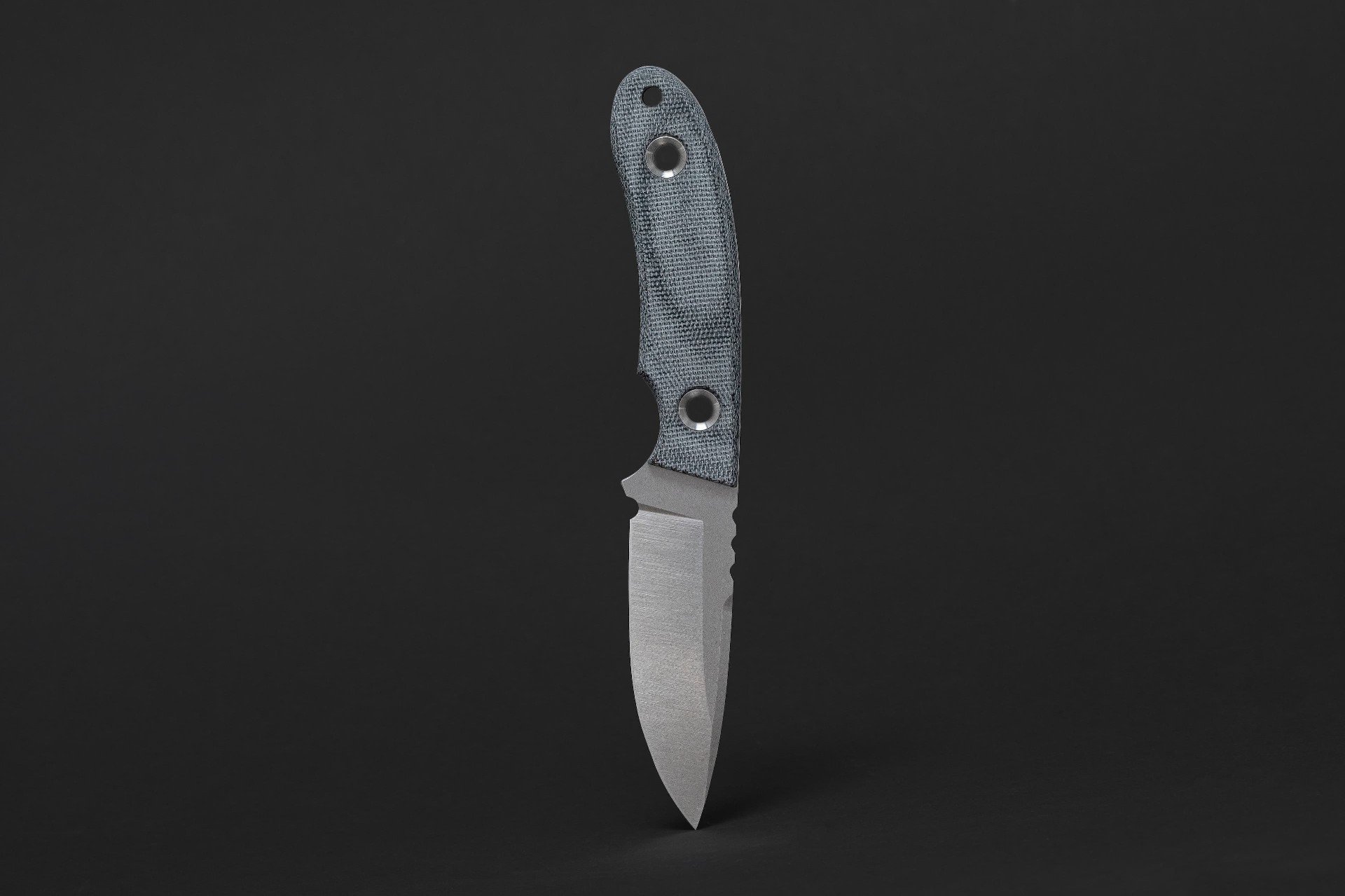 TRC knife detail view 2 showing blade detail and steel finish