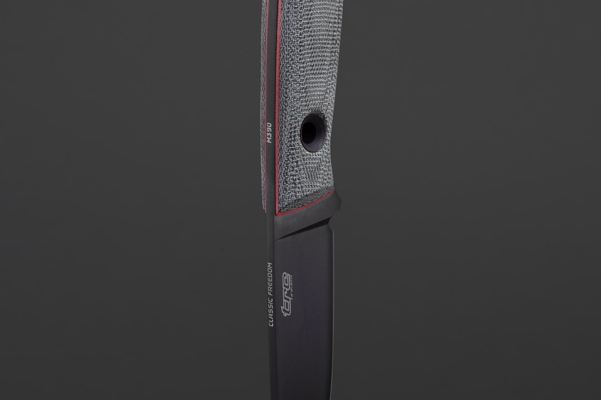 TRC knife detail view 3 showing handle ergonomics and material